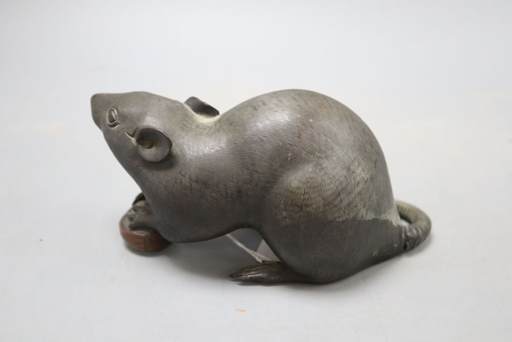 A Japanese bronze rat with acorn, Meiji period, signed, length 18cm